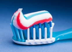 toothpaste on toothbrush