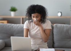 woman sneezing